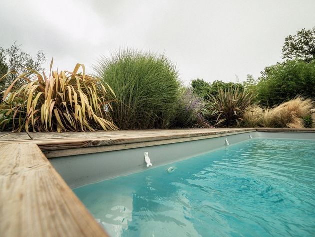 Terrasse autour de piscine par Bonnet Paysagiste